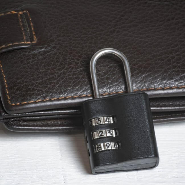 Leather wallet with a combination lock. Safe storage of money. Financial security